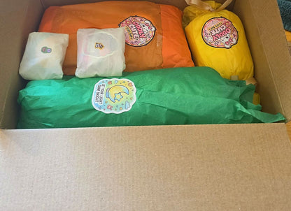 Oddly Cute Kids Mystery Box contents laid out